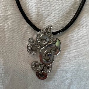 Silver and jewel accent on leather rope necklace by Chisel